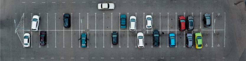 aerial view of cars parked in a parking lot