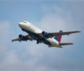 delta airplane flying in the sky